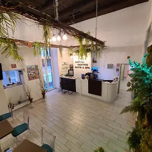Centro E Casa de hóspedes